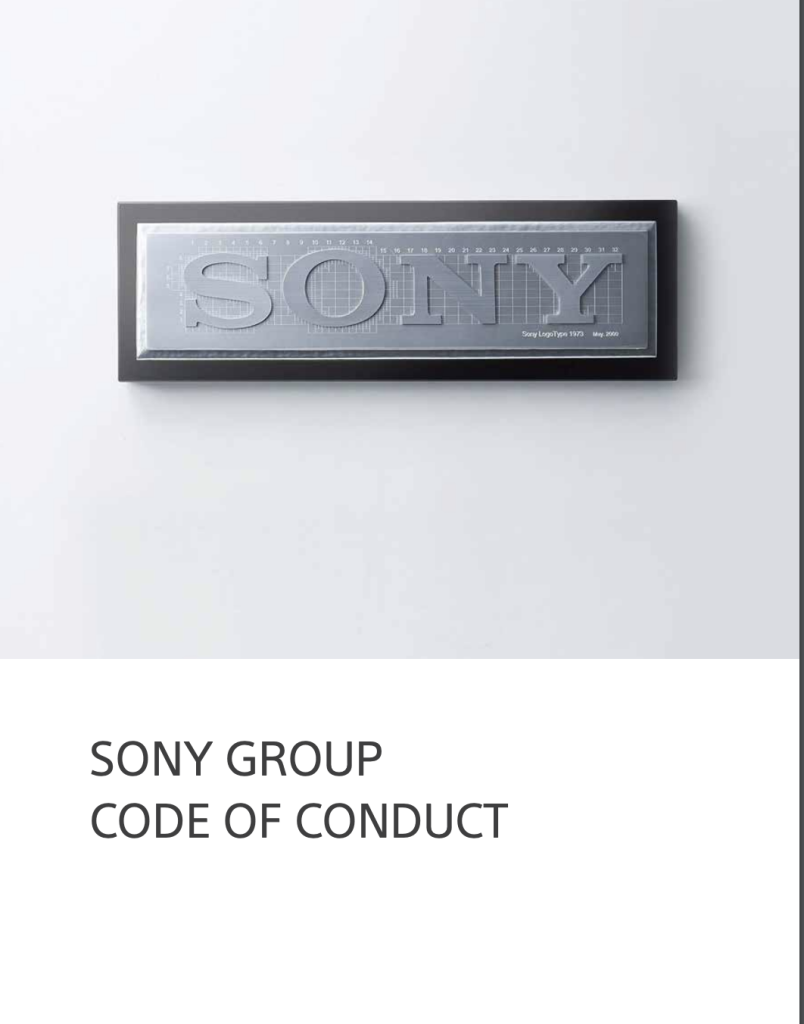 Metallic plaque with the text sony group code of conduct mounted on a dark frame