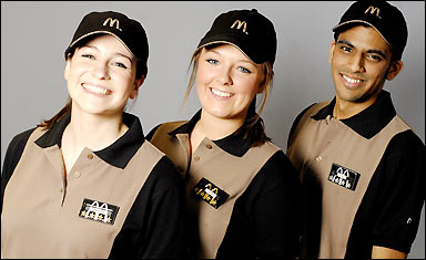 Ep9 mcdonalds uniform 1 Three mcdonalds crew members in brown uniforms and caps smile at the camera