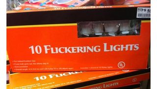 Orange product box on a store shelf labeled 10 flickering lights with bold white text on a red orange background