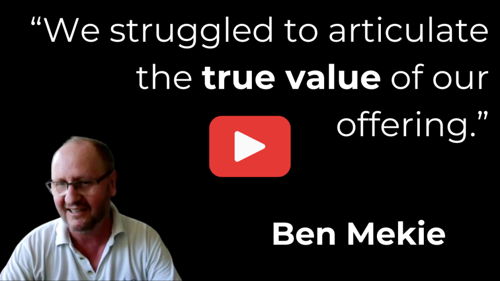 Video thumbnail a man smiling bottom left on a black background with a large white quote and a central red play button speaker name ben mekie bottom right