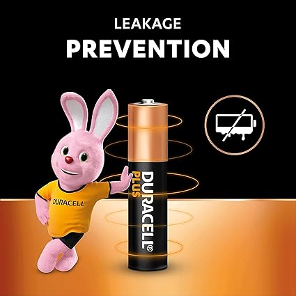 Advertisement graphic with the words leakage prevention featuring the duracell bunny and a duracell plus aa battery beside a no leakage symbol on a black background