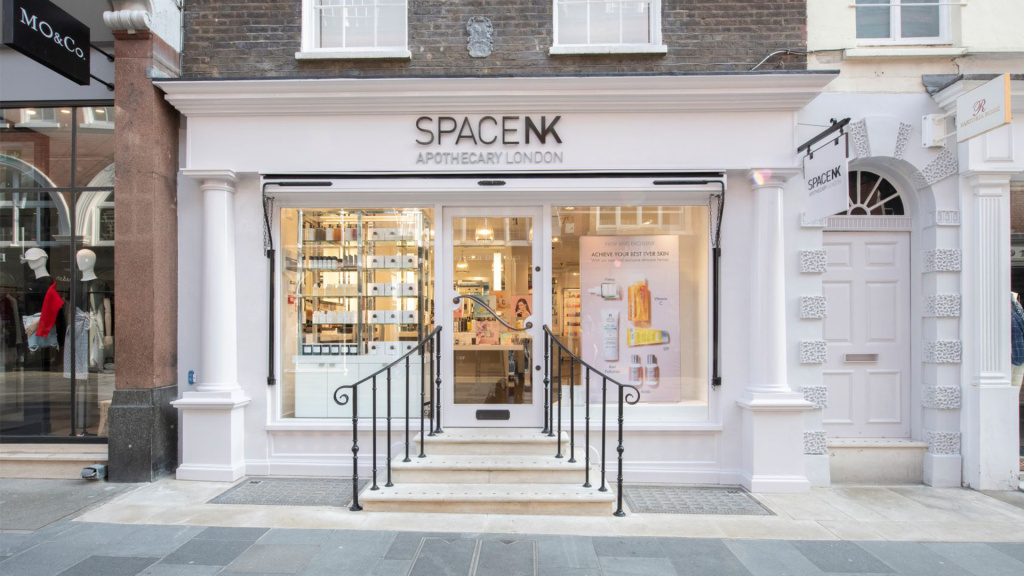 Space nk apothecary london storefront with glass doors and product displays inside