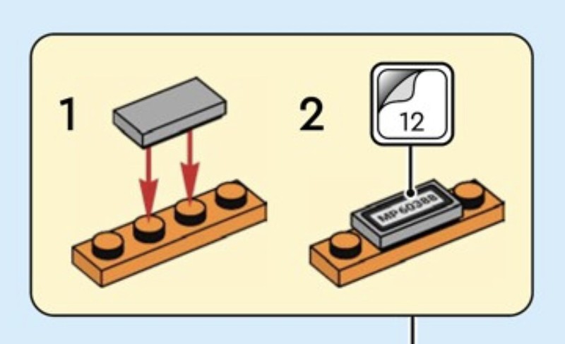 Lego instruction panel step 1 shows pressing two gray bricks onto an orange base plate step 2 shows placing a small scale with a 12 reading on the base plate