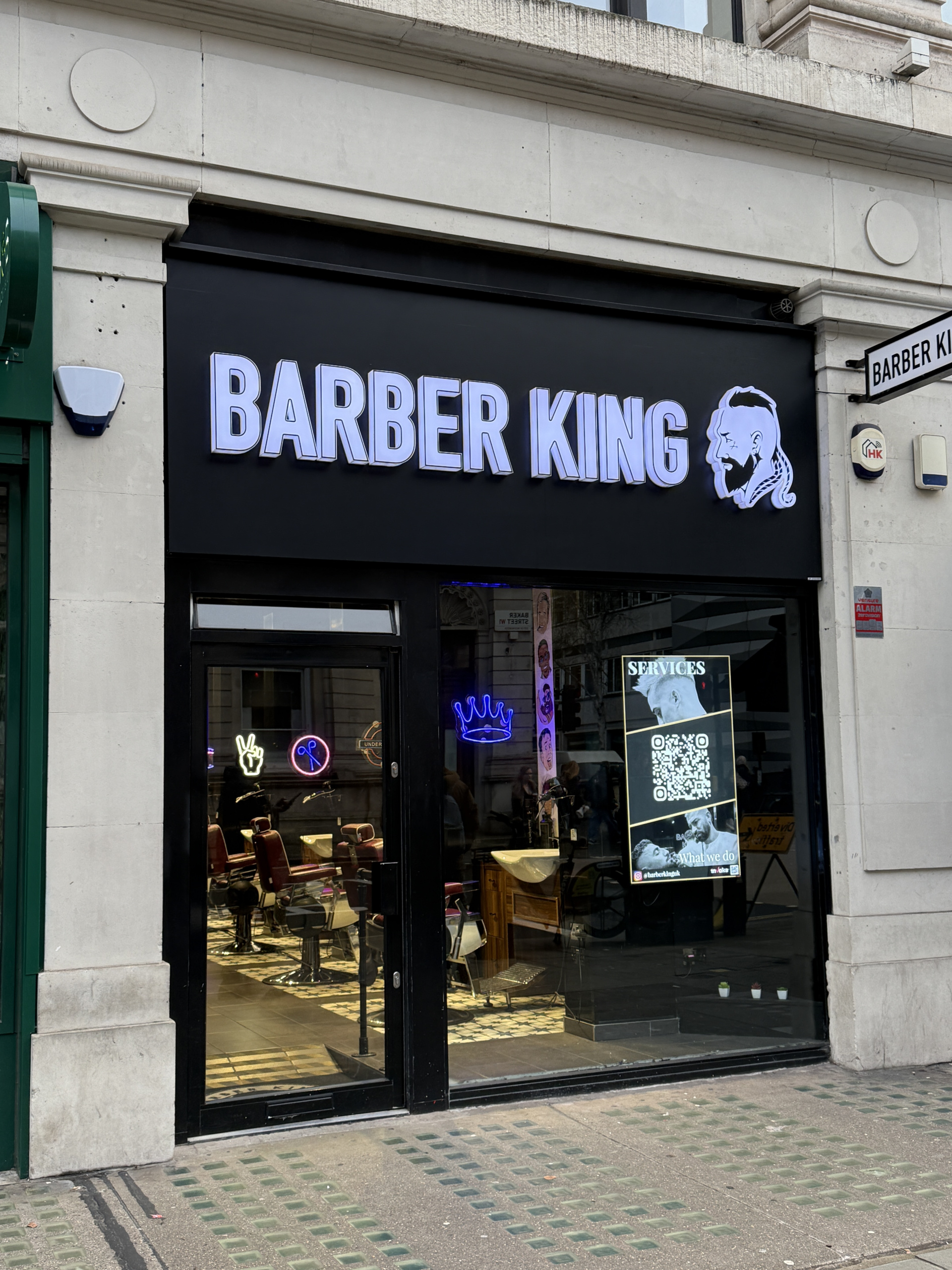 Barber king shopfront sign a pun on burger king