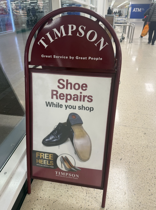 Timpson shoe repair counter inside a supermarket an example of a while you wait service