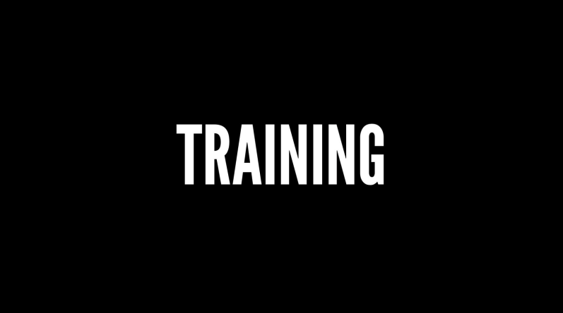 Bold white word training centered on a black background banner style