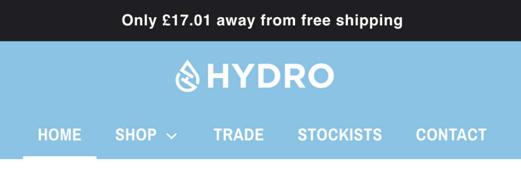 Screenshot 2024 04 05 at 11 09 33 Website header banner for hydro featuring a blue navigation bar with logo and links home shop trade stockists contact top black strip shows free shipping offer