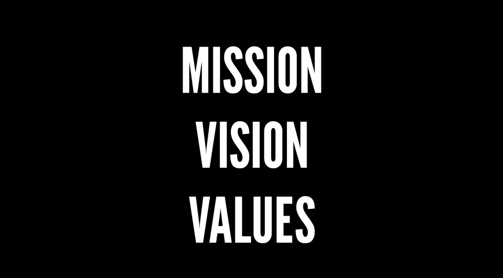 Screenshot 2024 05 09 at 18 41 35 Bold white text on a black background listing key words mission vision values stacked vertically