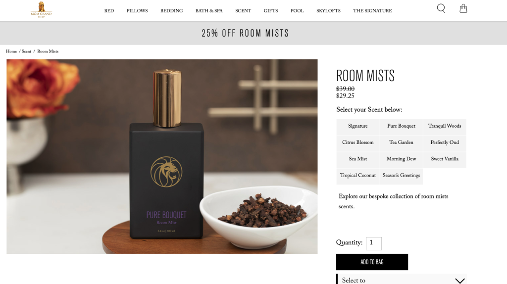 Screenshot 2025 08 15 at 09 03 48 Black square room mist bottle with a gold cap and gold emblem labeled pure bouquet room mist on a wooden tray beside a white bowl of potpourri